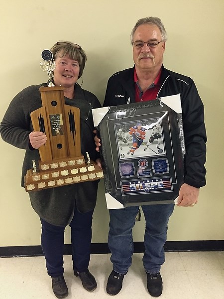 Dean Ziegler of the North Zone Referees Committee presents Karen Brown with the Mike Bugaida Award for female with outstanding dedication to the Referees’ Program for her 19