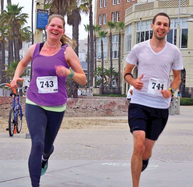 Jon Kramer keeps pace with his wife Kim at the Winter’s End half-marathon in California last February. Kramer ran his first marathon, the Red Deer Marathon, May 21 to raise