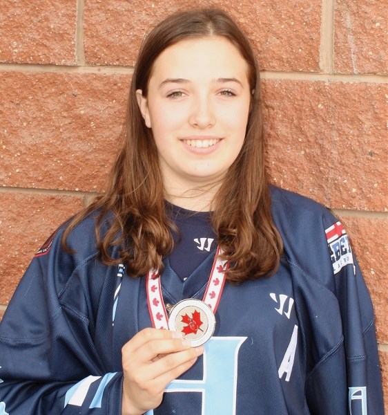 Britannie Ouimet, pictured here in 2015 with a silver medal from the Canadian Lacrosse Association Midget National Championship, has earned a field lacrosse scholarship to