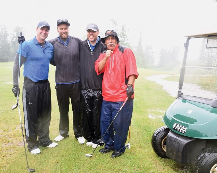 Golfers battled the rain at the Westlock Golf Course June 9 for the 18th annual Jean Duteau Memorial Golf Tournament. Wishful thinking that the rain would lighten up didn’t