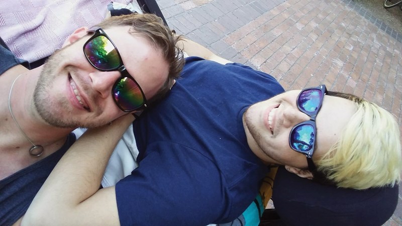 On July 5 Jamie Eherer (left) and Dwyght Duperron enjoy the sun outside of the University of Alberta Hospital. A June 8 diving accident at Narrow Lake left Duperron paralyzed.