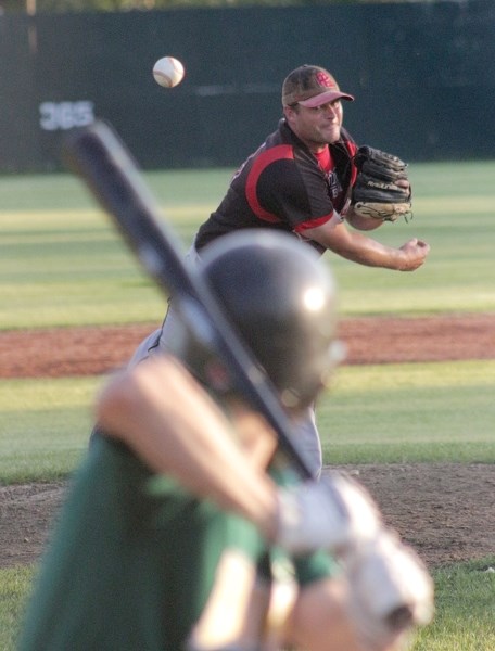 In what may have been his last game as a Red Lion, Adam Sawatzky deals from the mound during a 9-0 loss to the Edmonton Blackhawks July 28 at Keller Field. The club now sits