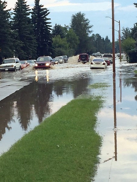 Residents are hoping for relief after a severe July 27 thunderstorm flooded roads on 102 Ave. and 105 St. and felled trees throughout the town. The Town of Westlock is