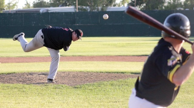 Grey Lions pitcher Rainie Gervais fires a bullet during a July 31 game against the Edmonton Pirates. The Grey Lions won their last regular season match 12-2 and went on to