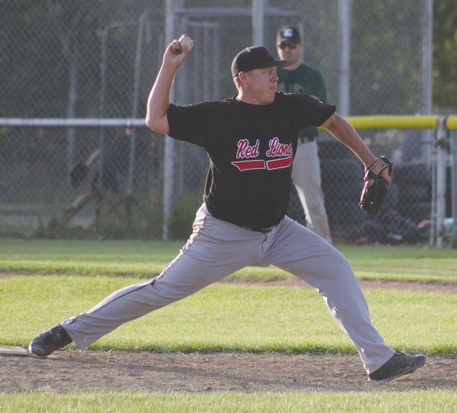 Grey Lions’ pitcher Carmen Brown winds up to throw a bullet during a Game 1 win over the Spruce Grove Eagles in the AWCBA championship at Keller Field Aug. 17.