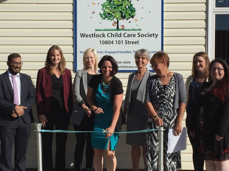 Alberta’s Minister of Children’s Services Danielle Larivee cuts the ribbon at the Westlock Community Daycare Sept. 5 in honour of the Westlock Child Care Society receiving a
