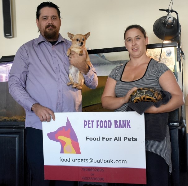 MMM Pet Food Bank Society co-founders Rachelle and Kevin Wood are pleading with the public to donate cat and dog food. The society has temporarily shut its doors and is