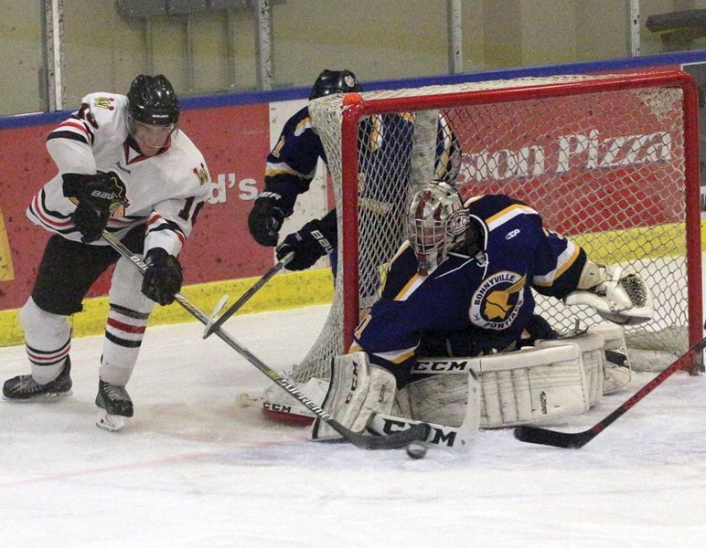Warriors forward Tyler Nault attempts a wraparound, but is stopped by the Bonnyville Pontiacs goaltender during the club’s season-opening 9-1 loss Oct. 20. The following
