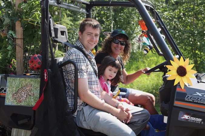  Erik Nickolson and daughter Yuzuki, along with Donna Dul were in the Bat and Bird Conservancy side-by-side during the parade.