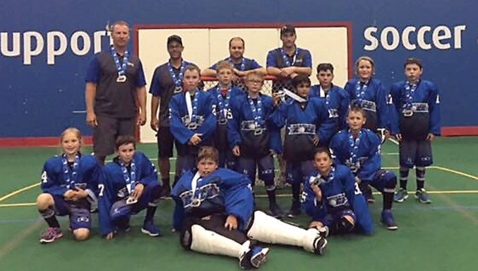  RIGHT: The novice Rock gathered for a team photo following their second-place finish at the Alberta Lacrosse Association provincial finals in Calgary July 12-15. Back row, L-R: Coaches Steve McKenna, Travis Boissonault, Bill Norton and head coach Rory McCormick. Middle row, L-R: Alex McCormick, Owen McKenna, Lucas Boissonault, Moses Raju, Blake Wilejto, Blake Boulerice and Dyllan Chiswell. Front Row, L-R: Madison Guennette, Austin Norton, Devlyn Finnegan, Brennan Properzi and Memphis Durand.