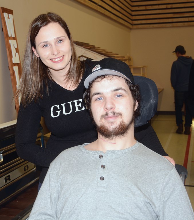  Joe Borris, 20, with his girlfriend Olivia Litchfield at the Jan. 5 fundraiser held in Flatbush in his honour. The community raised more than $45,000 for Borris who is now partially paralyzed following an Oct. 20 accident.