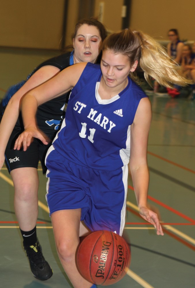 St. Mary School’s Jenna Schwarz drives to the hoop during the Romes’ Classic Jan. 11 at the Rotary Spirit Centre. The senior girls finished second, falling 54-51 to Thorsby in the Jan. 12 final.