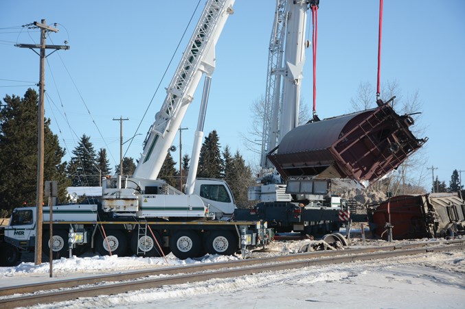  The site was cleaned up March 6, while one car was so badly damaged it had to be lifted with a crane and hauled away.