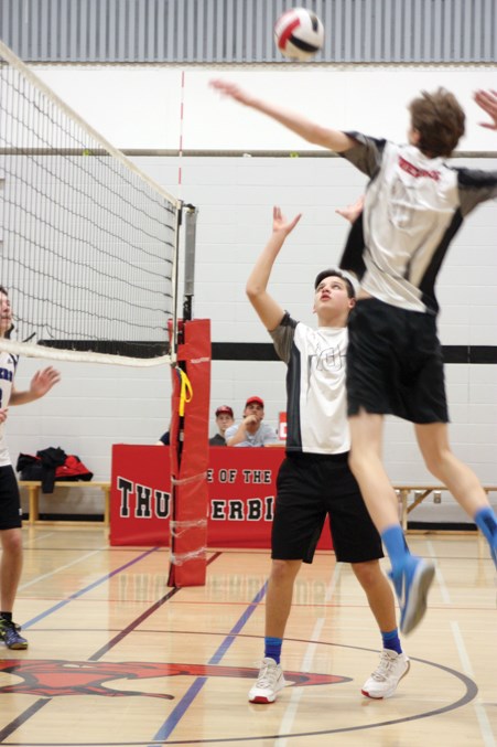 R.F. Staples School’s Dylan Macintyre sets up Mackenzie Hay for a spike during their game against Parkland Composite Nov. 16 during the North Central Zone 3A Boys Volleyball Tournament hosted at the school.