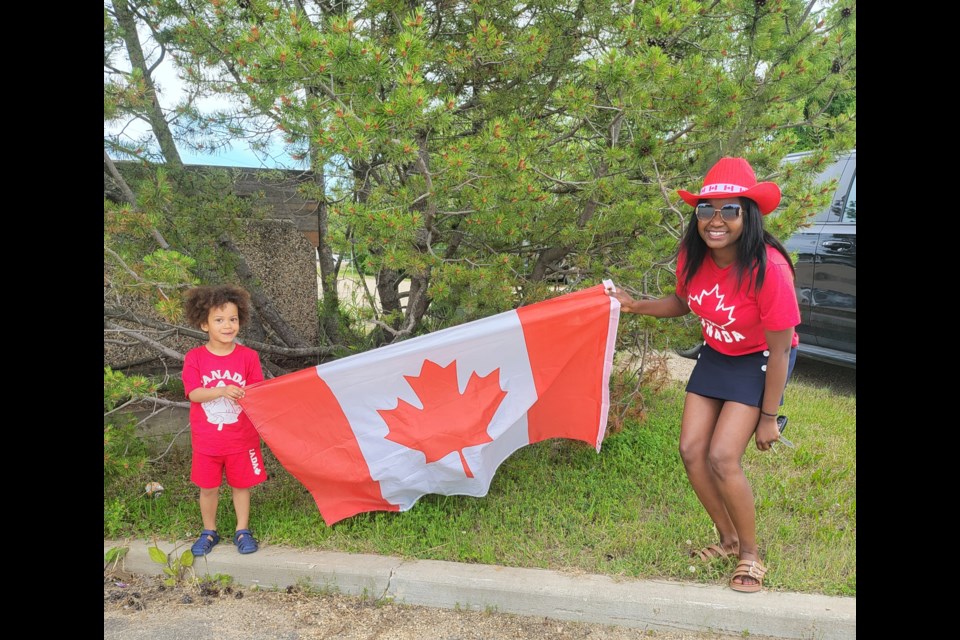 The Neerlandia Canada Day celebration had everyone in smiles on July 1 at the Neerlandia Public School Grounds. Pearl Peters with her son Eziah.