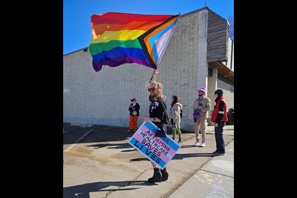 Hundreds of people from across Alberta came out to show their support during a three-hour pop-up party March 17 in downtown Westlock. Many carried signs of support and waved flags during the event.   


