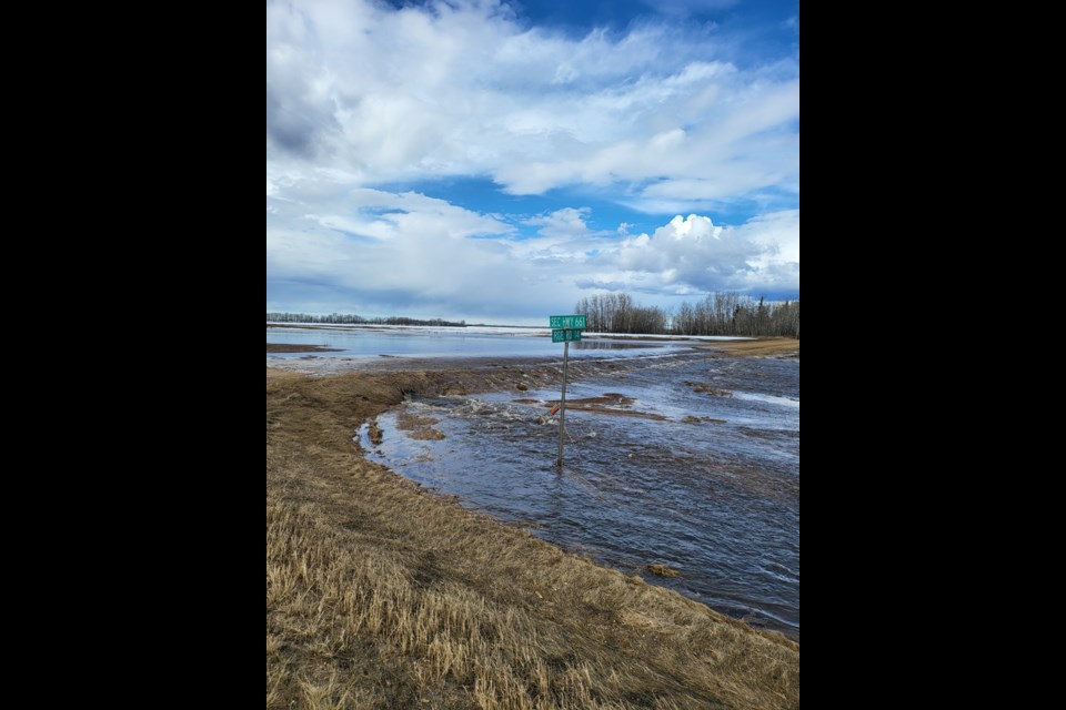 On April 8 after a fast melt and major rain event Range Road 14 at Highway 44 was under water.