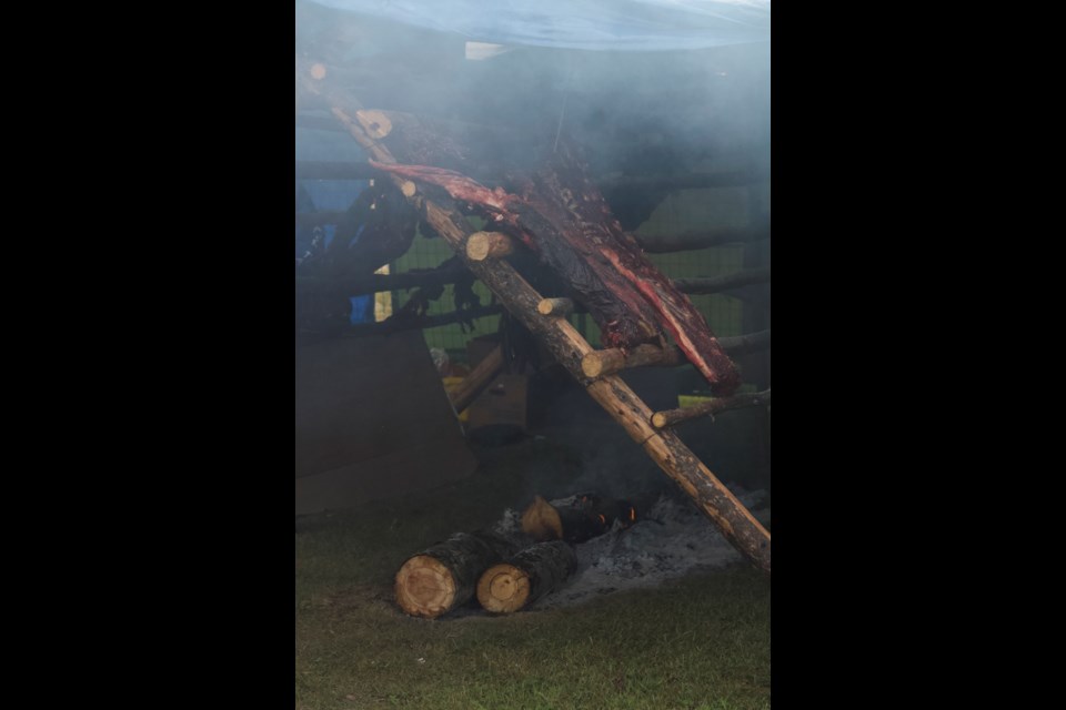 Each night of the festival featured a tradtional meal for guests to share. On Sept. 27, cooks smoked racks of moose ribs over an open fire, served alongside a vegetable mash.