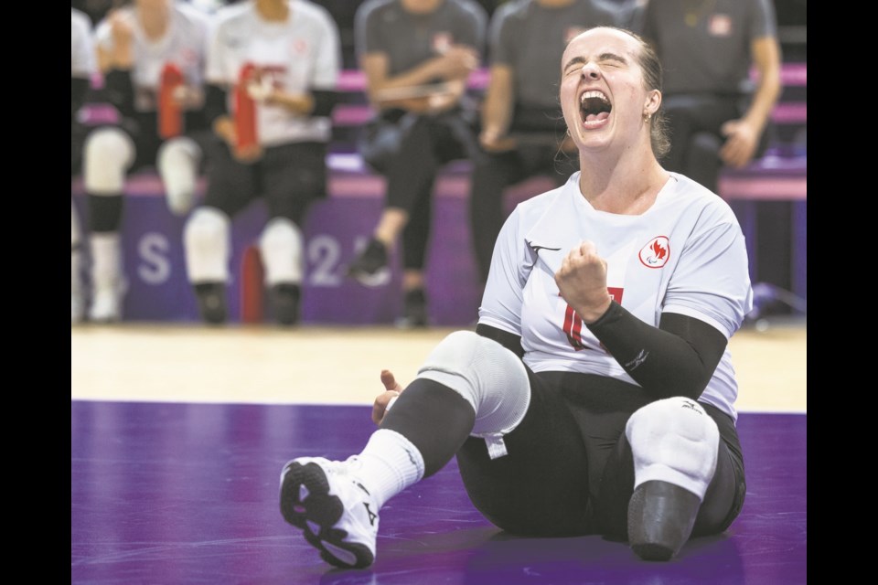 Canadian Heidi Peters, an outside hitter, celebrates scoring a point in the bronze medal matchup against Brazil. Peters led the team in scoring for the match with 18 points, including 11 in the first set. She finished second in scoring for the team with 60 points. She also recorded the fastest serve for the tournament during the bronze medal matchup, clocked at 68 km/h.