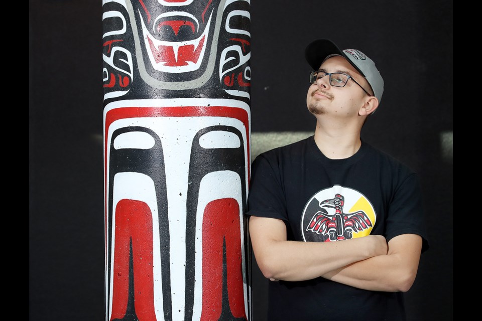 Indigenous artist Jacob Gillis created a totem and Coast Salish wall hanging for his high school alma mater, Terry Fox Secondary.