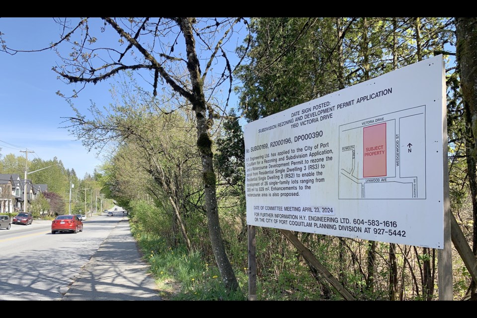 A rezoning sign in front of 1160 Victoria Dr. in Port Coquitlam on April 23, 2024.