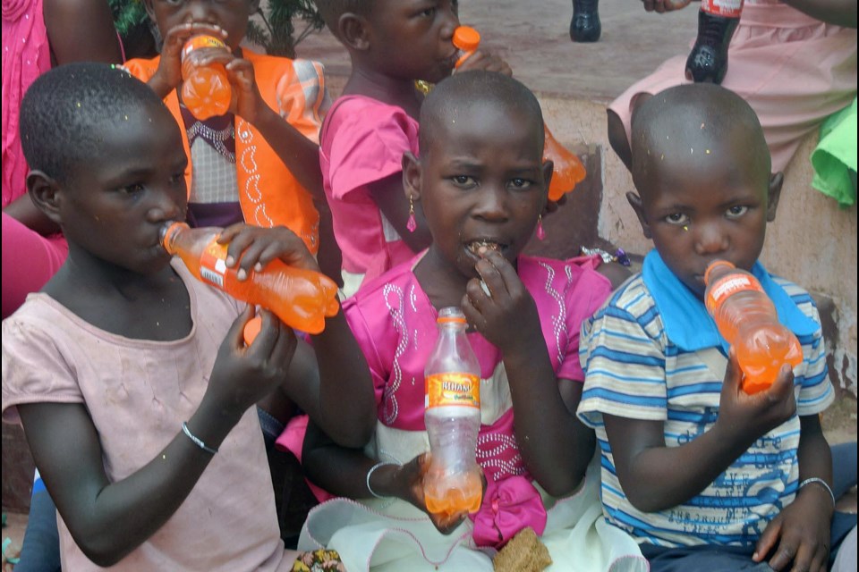 Some children from Abetavu, in Uganda, celebrating Christmas in December 2024.