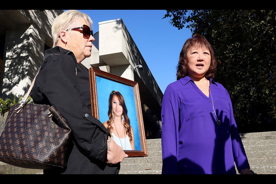 Carol Todd, right, shares her thoughts about the final phase of the trial at BC Supreme Court in New Westminster of the man convicted of exploiting her daughter, Amanda, online.