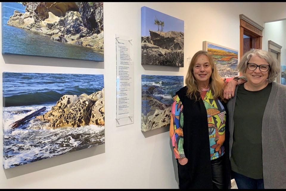 New Westminster's Carolyn Sullivan with Burnaby resident Denise Jeffrey at PoMoArts in Port Moody on March 20, 2024.