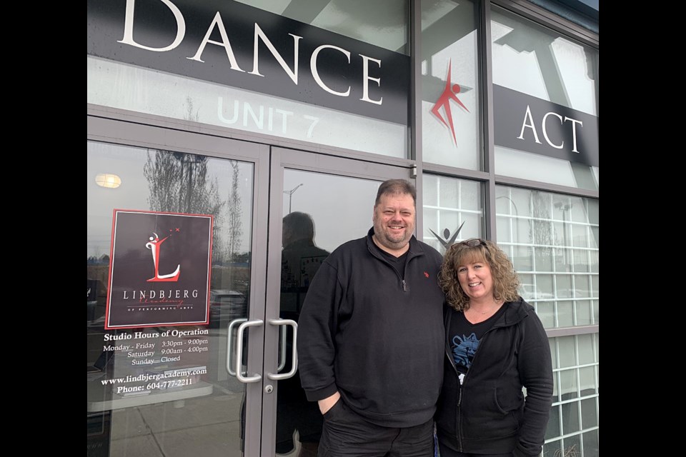 Chad and Erin Matchette outside of the Lindbjerg Academy of Performing Arts in Coquitlam.