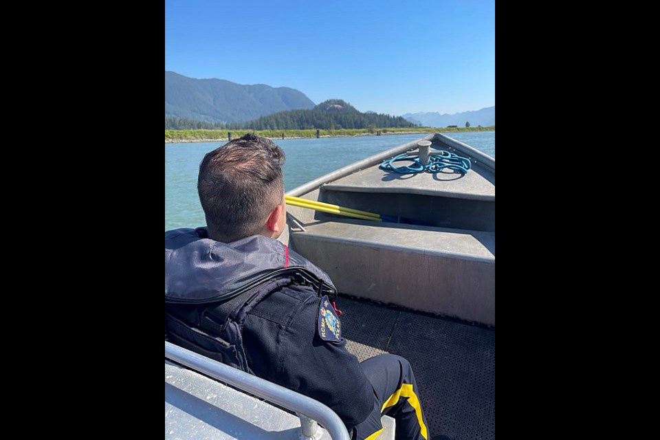 Coquitlam RCMP's rural unit investigates a suspicious structure along the Pitt River on July 16, 2024.