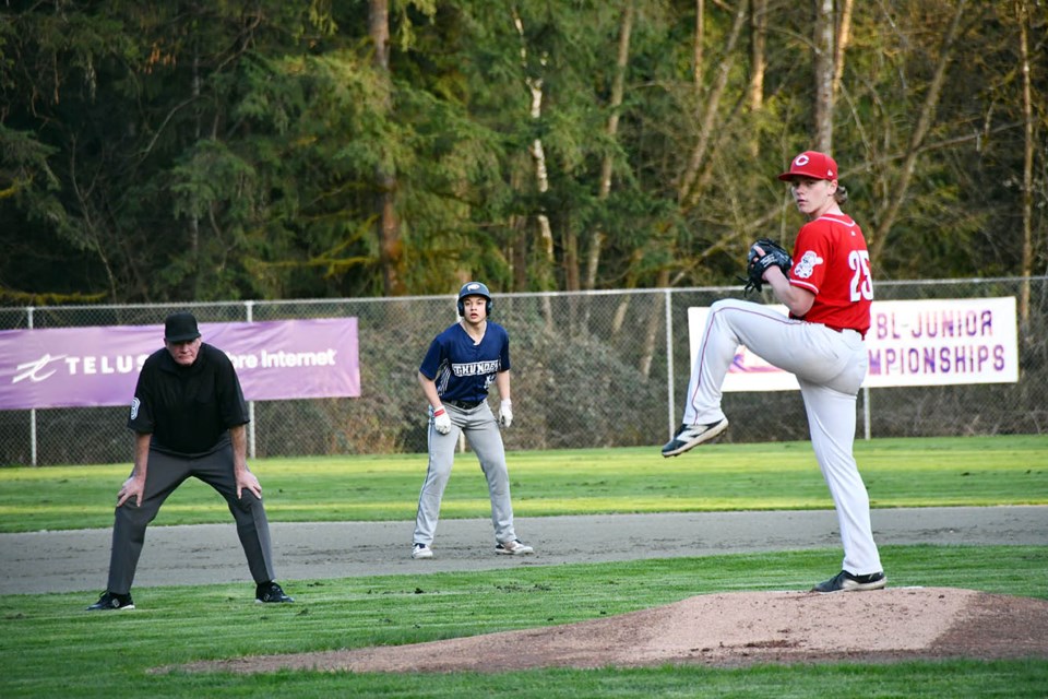 Fraser Warren pitches for the Coquitlam Junior Reds in a game against UBC at Mundy Park on April 3, 2025. 