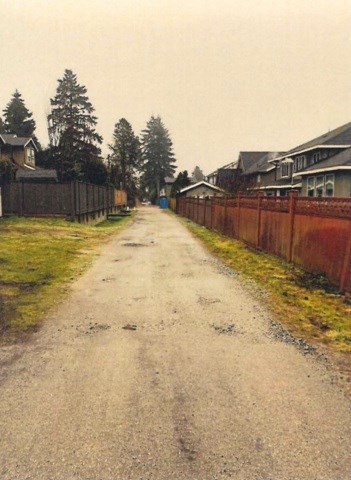 The lane between Rochester and Walls avenues in Coquitlam, facing east.