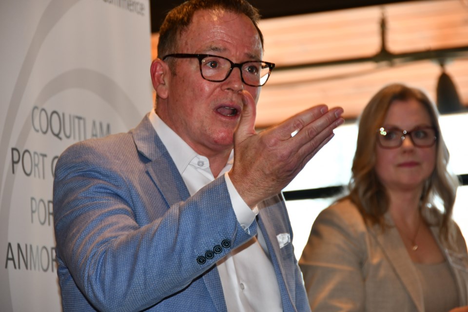 BC Liberal Leader Kevin Falcon speaks at the Vancouver Golf Club in Coquitlam on April 12, 2023. The Tri-Cities Chamber of Commerce's CEO Leslie Courchesne looks on.