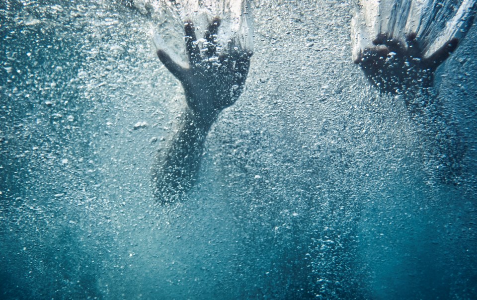 getty - hands under water