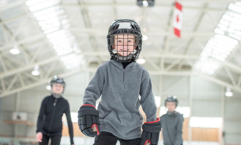 GettyImages-ice skating with helmet