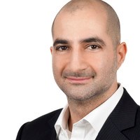 Hani Lamman, the executive vice president of the Cressey Development Group, spoke before Coquitlam elected officials on May 13, 2024, to criticized the city's Tenant Relocation Policy.