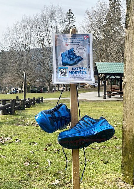 Blue hiking boots at Port Moody's Rocky Point Park promote the May 5, 2024, Hike for Hospice.