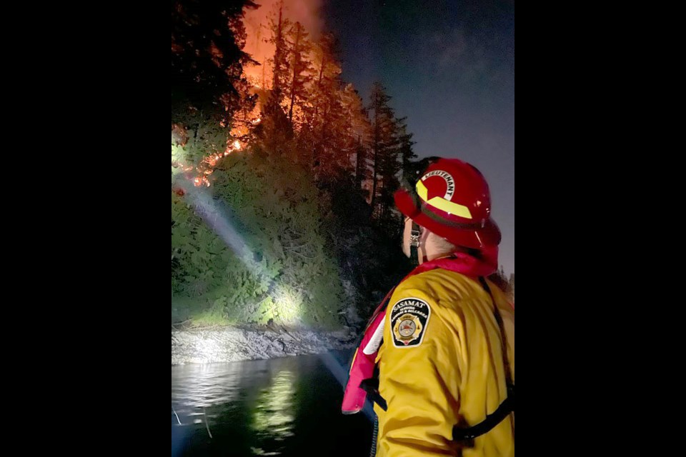 The fire on the grounds of the former Camp Howdy, near Belcarra Regional Park.