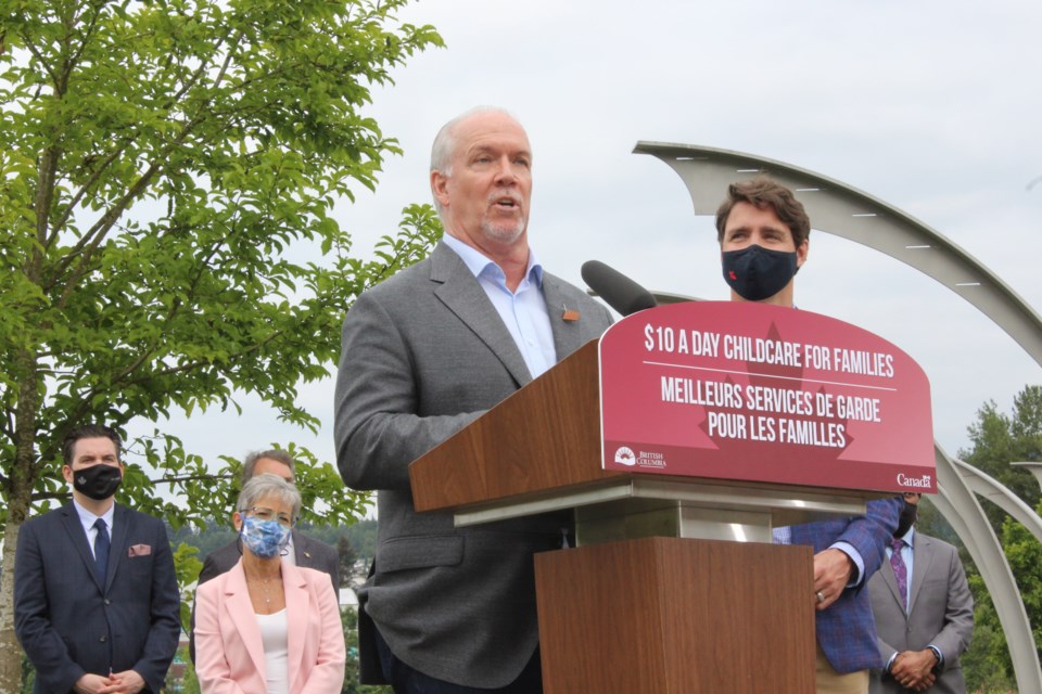 Premier John Horgan takes questions from media.