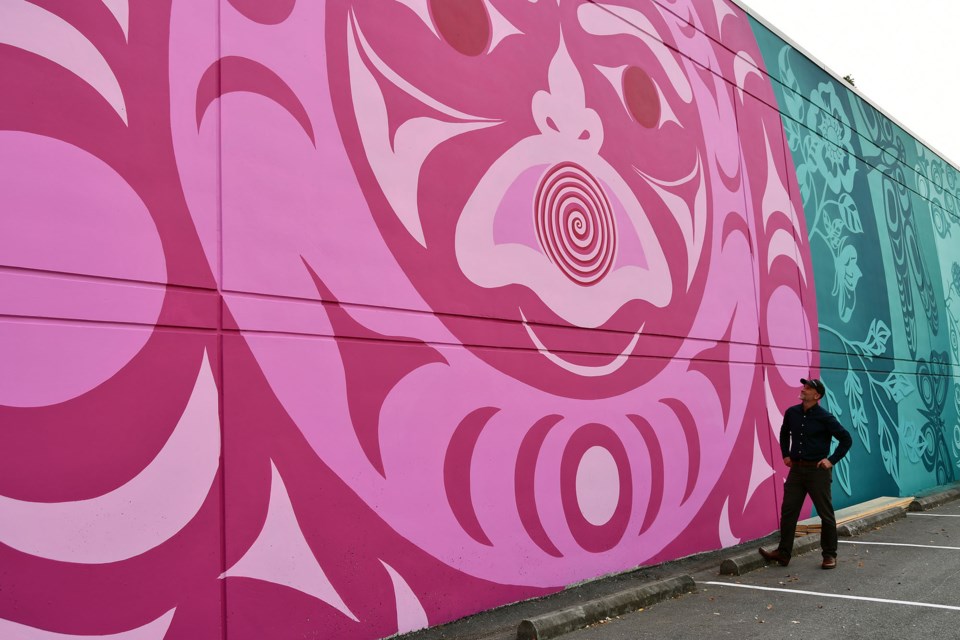 Coquitlam's utilities director Jonathan Helmus, who is overseeing the city's Streetscape Enhancement Program, looks at The Ripple by Coquitlam City Hall on Aug. 28, 2023.