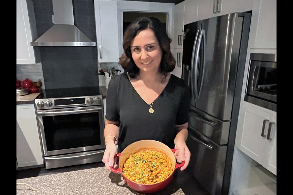 Coquitlam resident and Tri-City News publisher Lara Graham shows her corn curry dish.