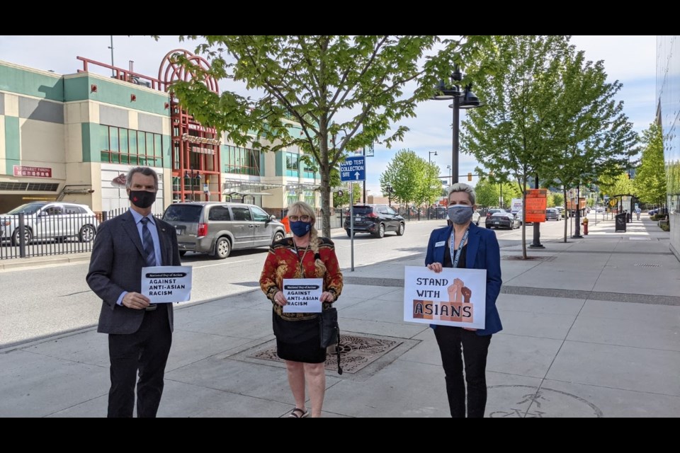 MLA Fin Donnelly, Coun. Nancy McCurrach and Coun. Bonita Zarrillo protested at the Lincoln station on Monday afternoon.