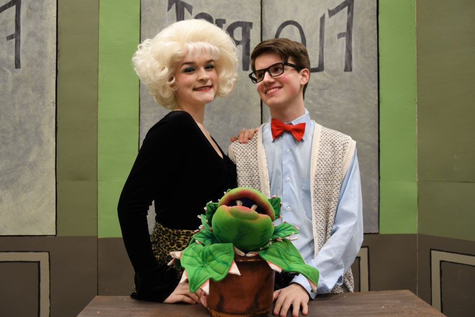 Grade 12 students Carly Warner and Bennett Renaud portray the characters of Audrey and Seymour in the Archbishop Carney Regional Secondary School production of Little Shop of Horrors. The show runs May 18 to 21 at Terry Fox Theatre in Port Coquitlam.