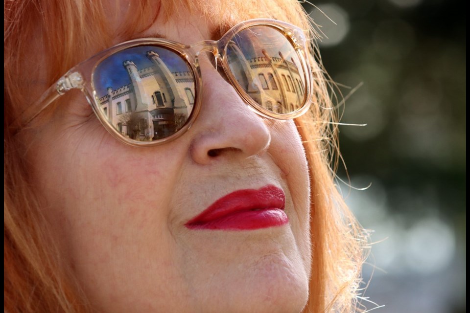 Margaret Franz of Port Coquitlam visits the gatehouse building at the old BC Pen in New Westminster where her sister was taken hostage by prisoner in 1975 and was eventually killed in the incident. Franz has authored a book recounting the incident.