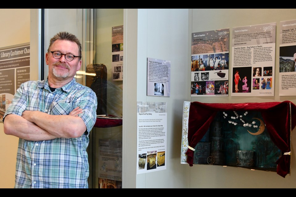 Markus Fahrner, exhibits manager of the Coquitlam Heritage Society, at the theatre exhibit he curated.