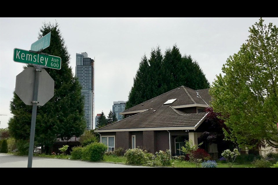The intersection of Kemsley Avenue and Elmwood Street in the Coquitlam neighbourhood of Oakdale, a largely single-family dwelling area close to the Burquitlam SkyTrain station.