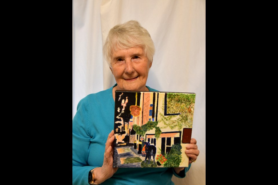 Coquitlam resident Pamela Burnell shows "Old Quebec City," the featured painting for the upcoming Coquitlam Art Club show at Dogwood Pavilion.