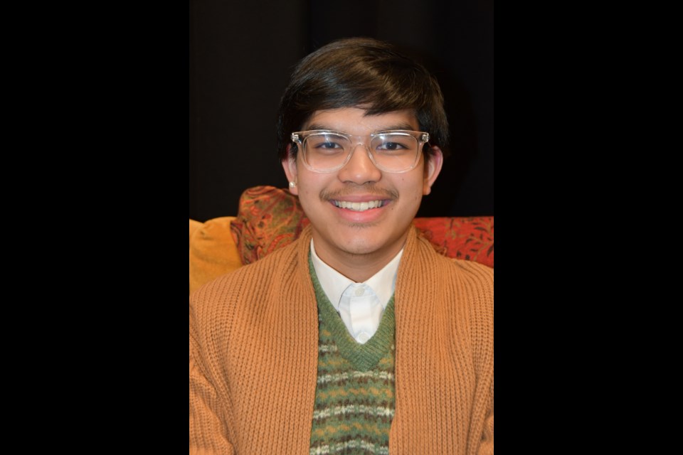 Grade 12 student Alastair Aligabo portrays The Man in Chair in Port Moody Secondary's "The Drowsy Chaperone."