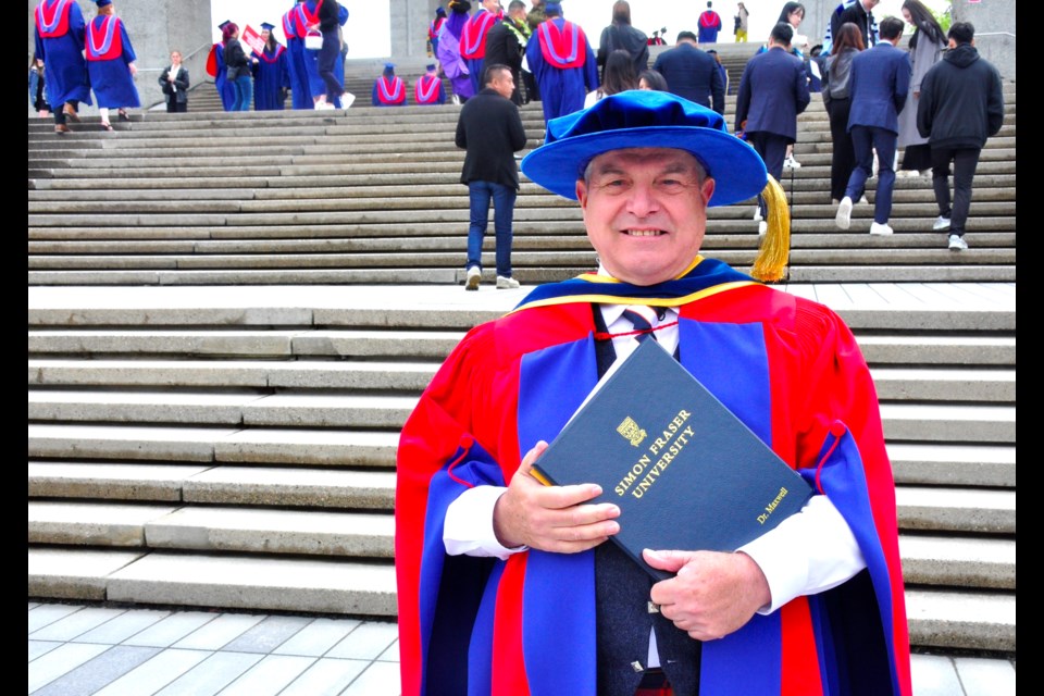 SFU Pipe Band lead drummer J. Reid Maxwell of Coquitlam earned a doctorate from SFU on June 11, 2024.