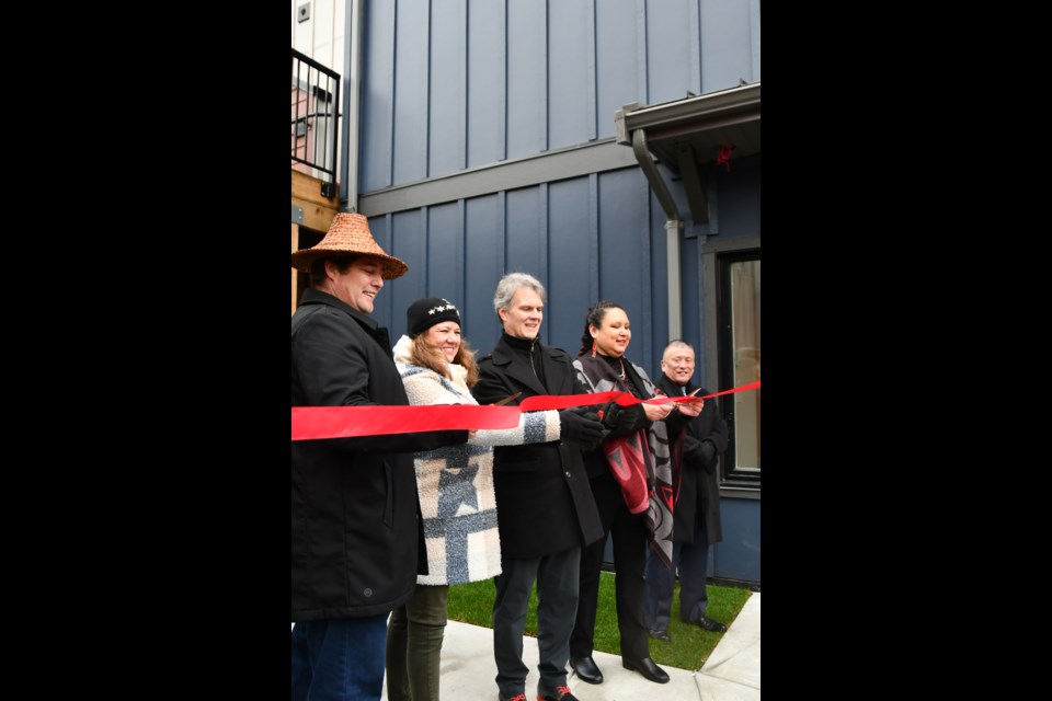 The ribbon cutting for Lot 16 (left to right): John Peters, KFN councillor; Allyson Rowe, BC Regional General, Indigenous Services Canada; Fin Donnelly, MLA for Coquitlam–Burke Mountain; Theresa Boyce, Manager of Community Infrastructure, KFN; and George Chaffee, KFN councillor.
